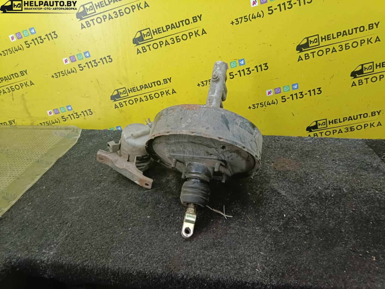 вакуумный усилитель тормозов Mitsubishi Galant 8 поколение 1998, 2.4 л., i, бензин, МКПП, седан, передний привод - фото №1