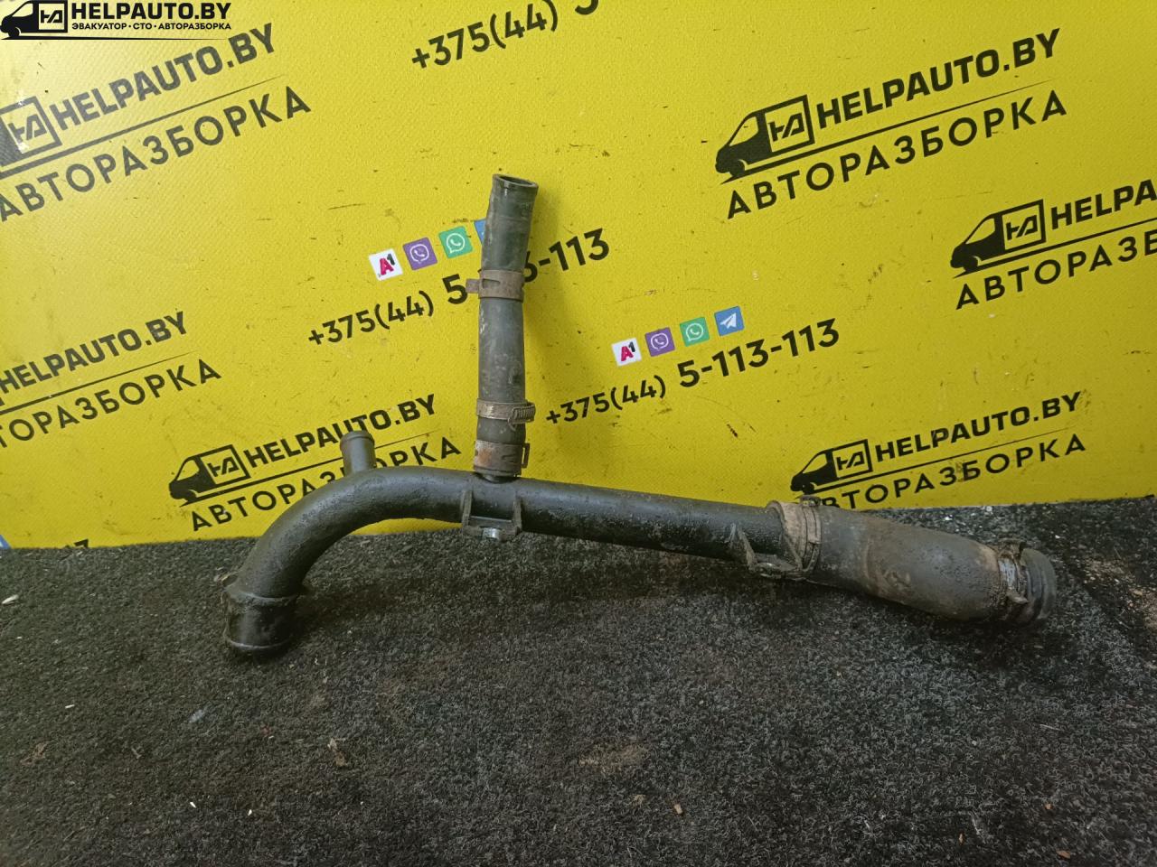 патрубок радиатора Daewoo Nubira J100 1998, 1.6 л., i, бензин, МКПП, хетчбэк 5 дв., передний привод, A16DMS - фото №1