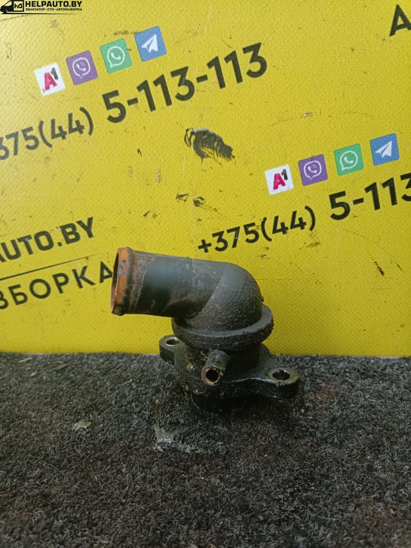 корпус термостата Daewoo Nubira J100 1998, 1.6 л., i, бензин, МКПП, хетчбэк 5 дв., передний привод, A16DMS - фото №1