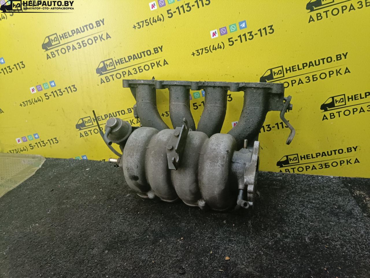 коллектор впускной Daewoo Nubira J100 1998, 1.6 л., i, бензин, МКПП, хетчбэк 5 дв., передний привод, A16DMS - фото №1
