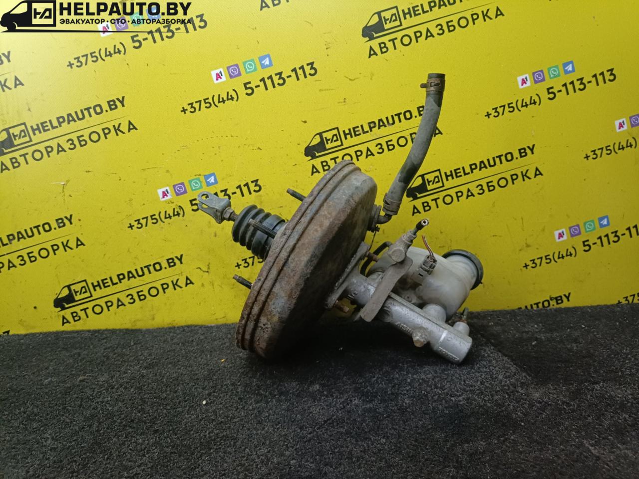 вакуумный усилитель тормозов Toyota Carina E 1 поколение 1997, 1.8 л., бензин, МКПП, хетчбэк 5 дв., передний привод, 7A-FE - фото №1