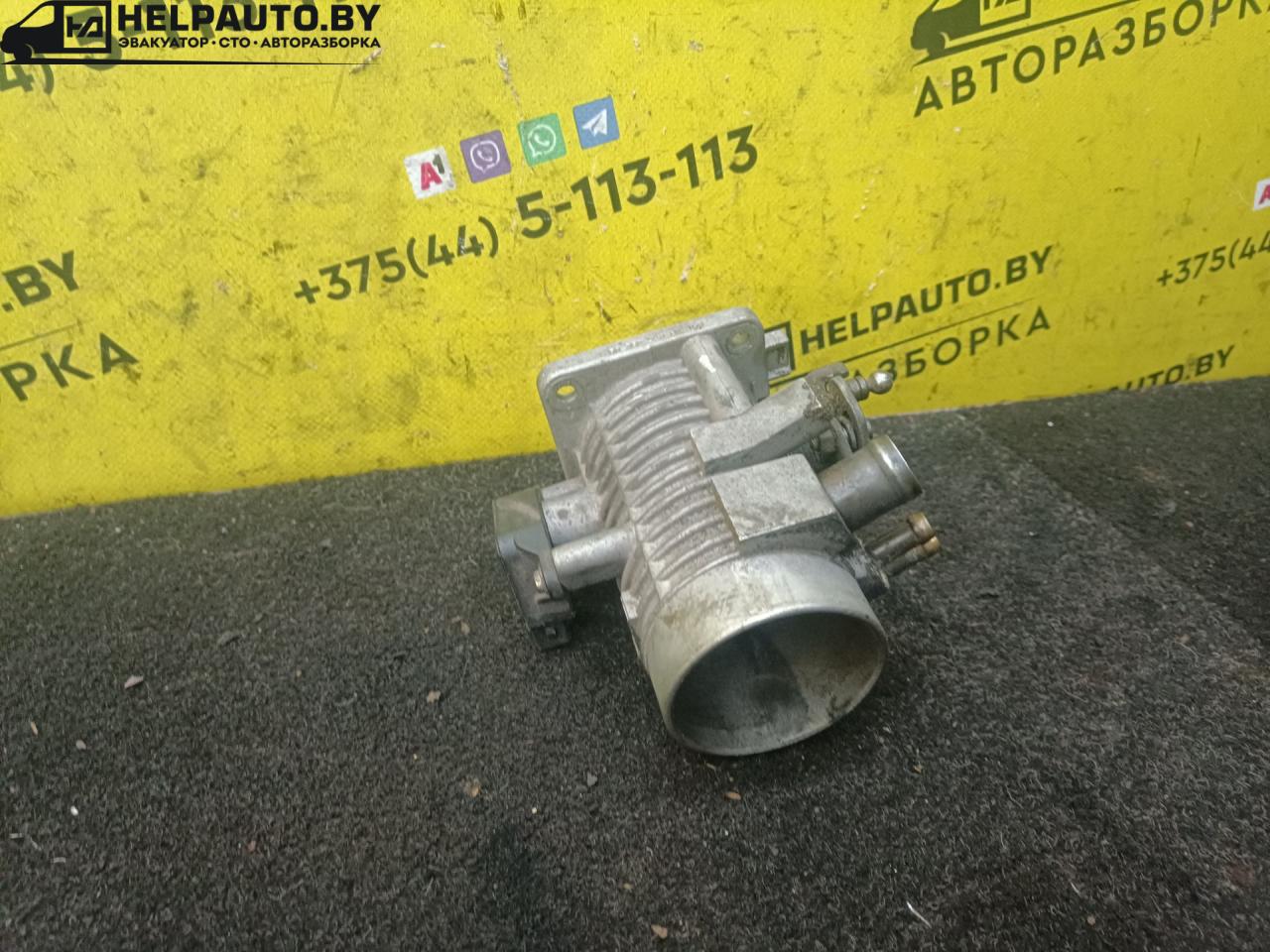 заслонка дроссельная Opel Vectra A 1991, 1.8 л., i, бензин, МКПП, седан, передний привод - фото №1