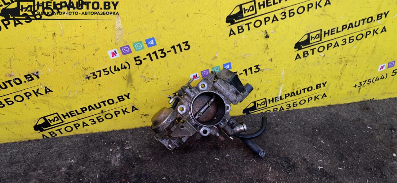заслонка дроссельная Mazda 626 3 поколение 1990, 2.0 л., бензин, МКПП, хетчбэк 5 дв., передний привод - фото №1