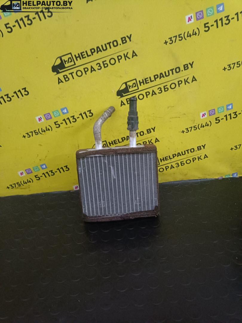 радиатор отопителя (печки) Mazda 323F BA 1996, 1.8 л., i, бензин, МКПП, хетчбэк 5 дв., передний привод - фото №1