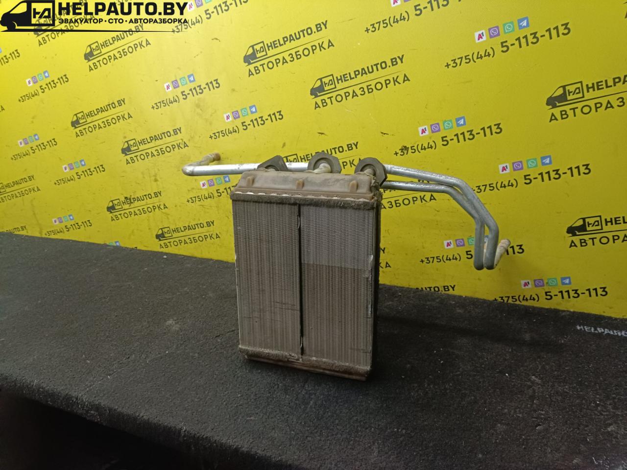 радиатор отопителя (печки) Mercedes-Benz E-Класс W124 1987, 2.0 л., i, бензин, МКПП, седан, задний привод - фото №1