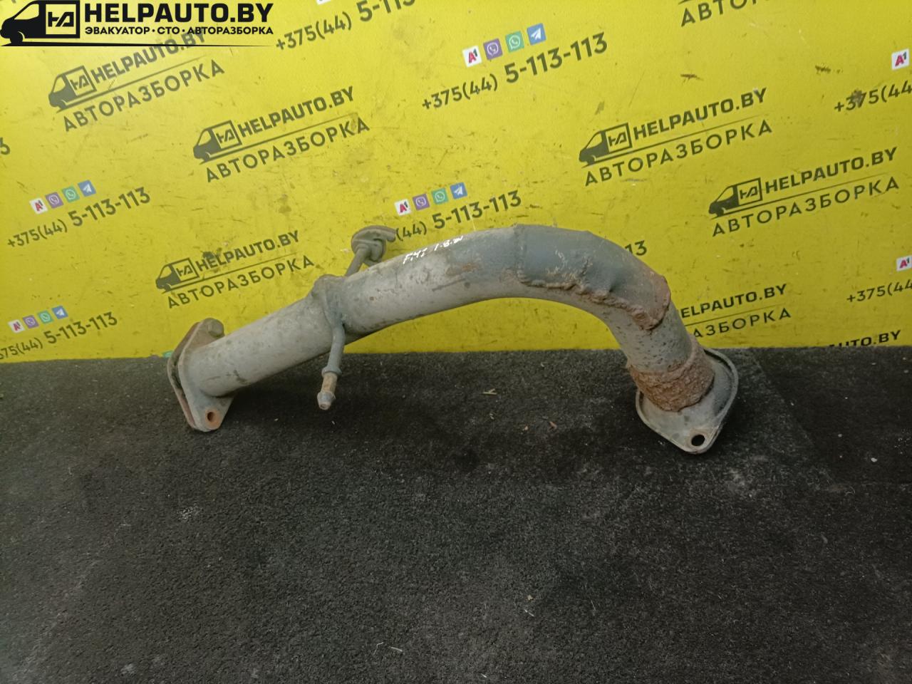 труба приемная глушителя Ford Mondeo 1 поколение 1995, 1.8 л., TD, дизель, МКПП, универсал, передний привод - фото №1