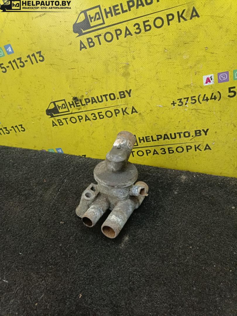 корпус термостата Alfa Romeo 146 1 поколение 1996, 1.4 л., i, бензин, АКПП, хетчбэк 5 дв., передний привод, BOXER - фото №1