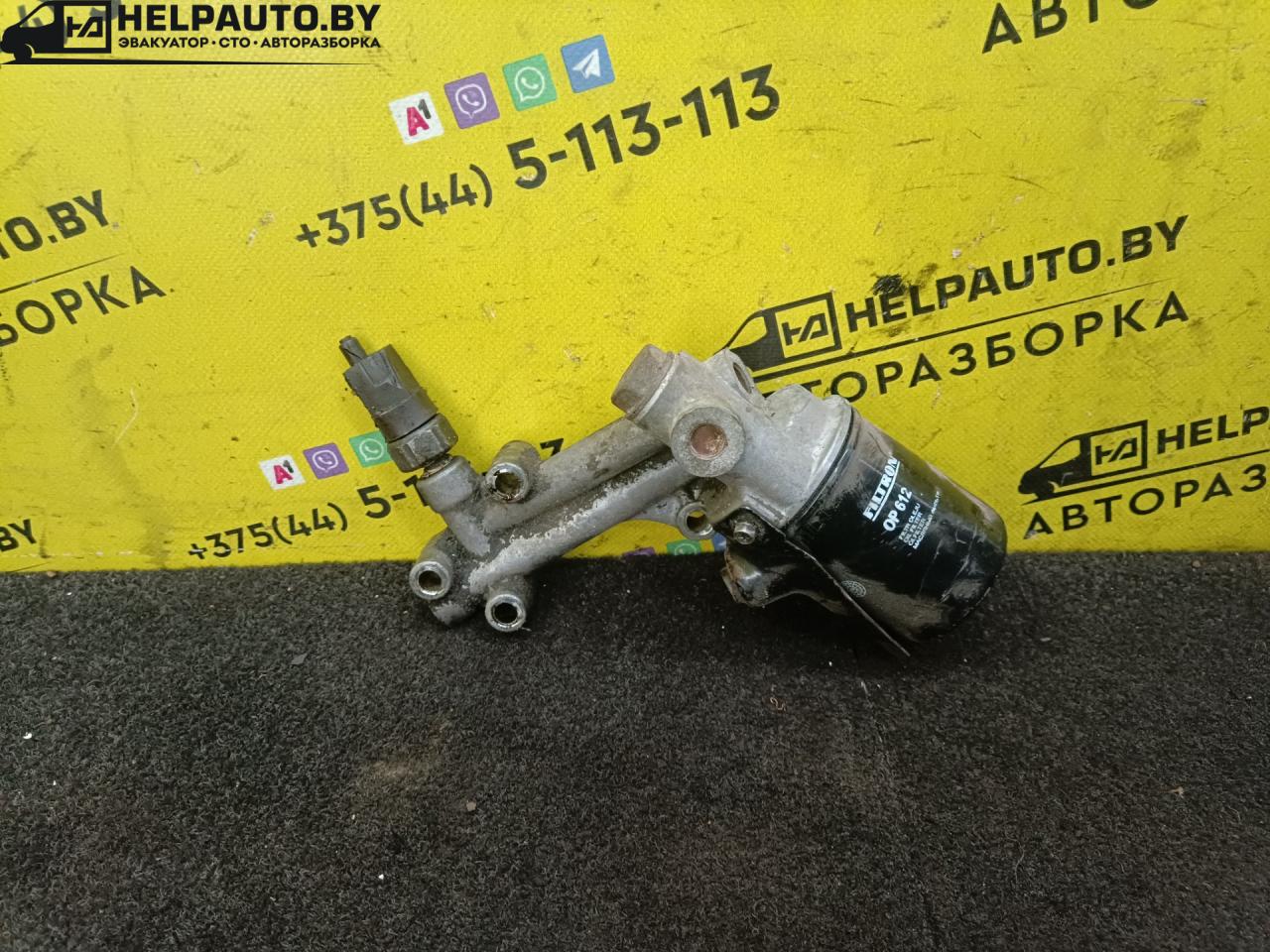 кронштейн масляного фильтра Nissan Primera P10 1995, 2.0 л., i, бензин, МКПП, седан, передний привод - фото №1
