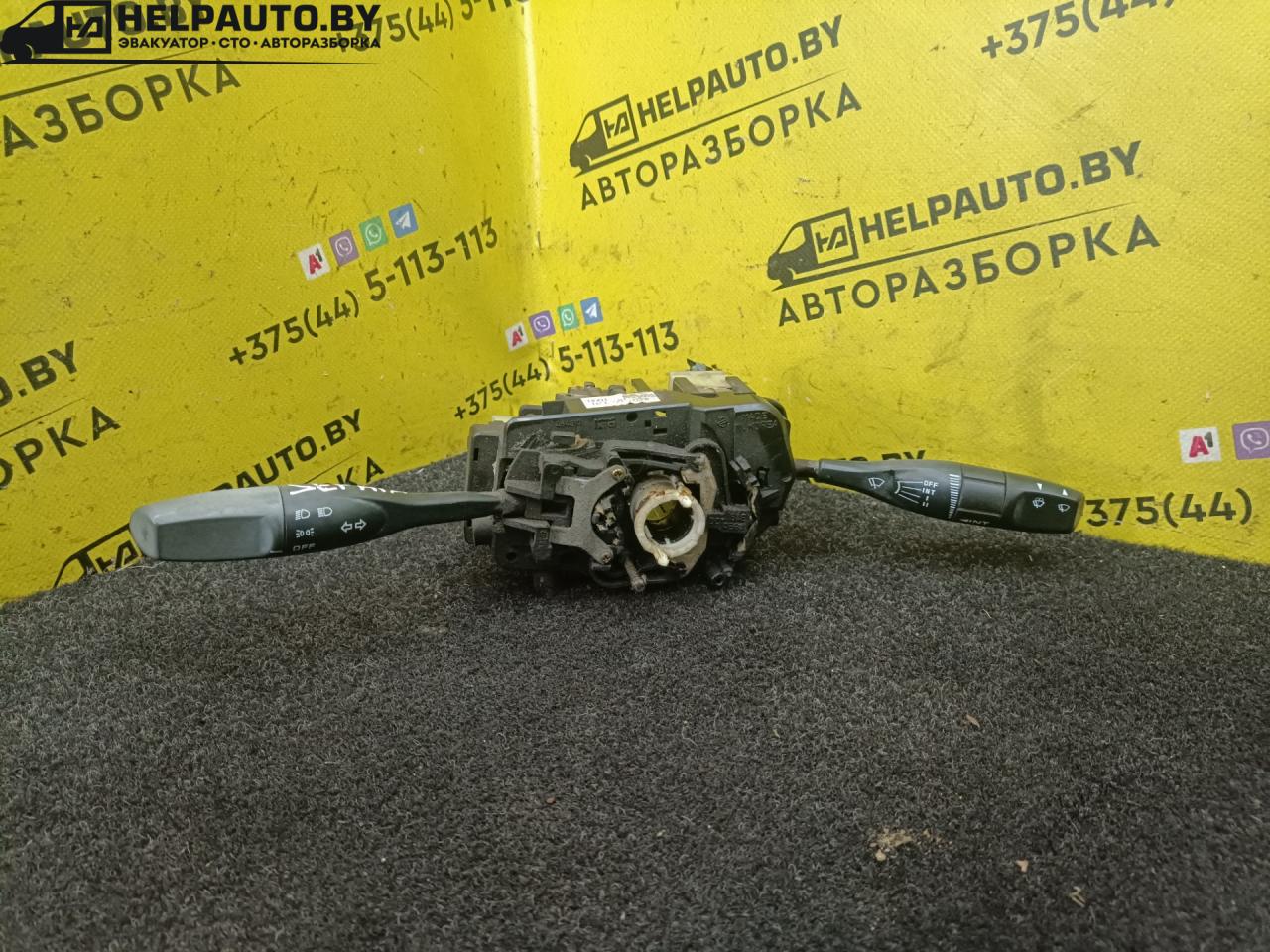 переключатель подрулевой (стрекоза) Kia Sephia 1 поколение 1993, 1.5 л., бензин, МКПП, белый, седан - фото №1