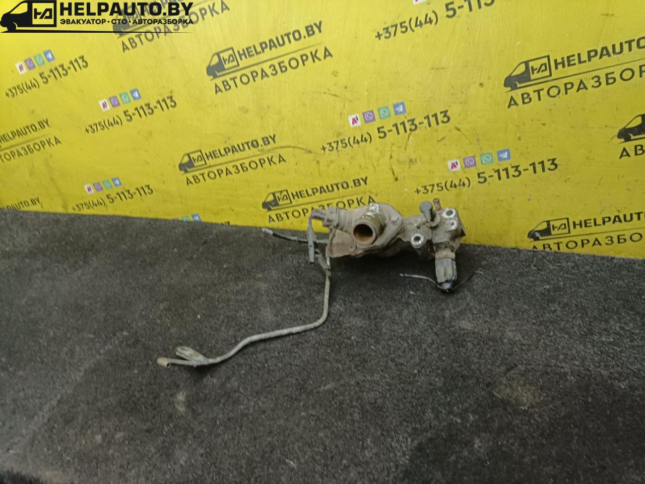 корпус термостата Ford Mondeo 1 поколение 1994, 1.8 л., TD, RFA, дизель, МКПП, универсал, передний привод - фото №1