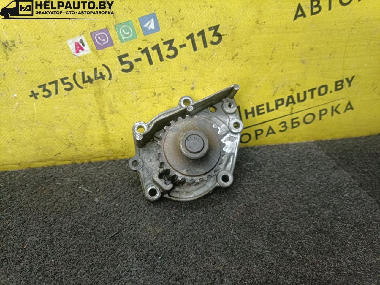 помпа Rover 400 Series 2 поколение 1995, 1.6 л., бензин, МКПП, серебристый, хетчбэк 5 дв. - фото №1