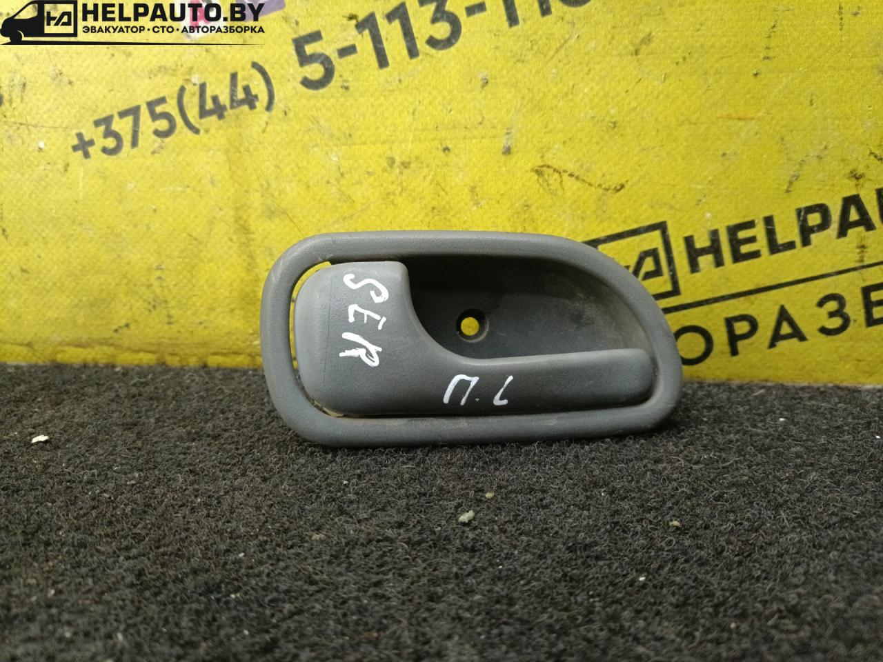 ручка внутренняя передняя левая Kia Sephia 1 поколение 1993, 1.5 л., бензин, МКПП, белый, седан - фото №1