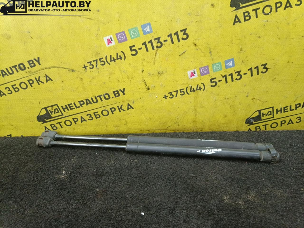 амортизатор крышки багажника (3-5 двери) Peugeot 405 1 поколение 1991, 1.8 л., дизель, МКПП, красный, универсал - фото №1