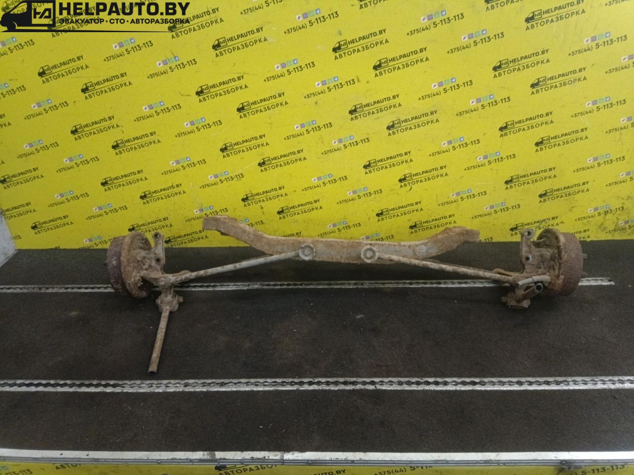 балка подвески задняя Toyota Carina E 1 поколение 1997, 2.0 л., дизель, МКПП, зеленый, седан - фото №1