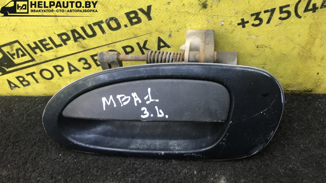 ручка наружная задняя левая Mazda 323F BA 1996, 1.8 л., BP, бензин, МКПП, серебристый, хетчбэк 5 дв. - фото №1