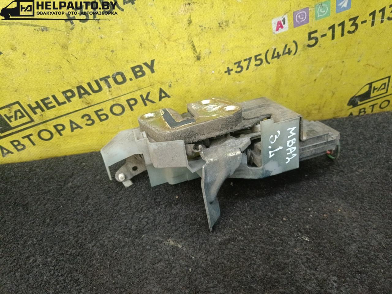 замок двери задней левой Mazda 323 5 поколение 1997, 1.5 л., бензин, МКПП, зелый, хетчбэк 5 дв., передний привод - фото №1