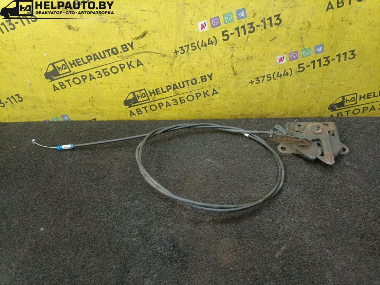 замок капота Mazda 323 5 поколение 1997, 1.5 л., бензин, МКПП, зелый, хетчбэк 5 дв., передний привод - фото №1