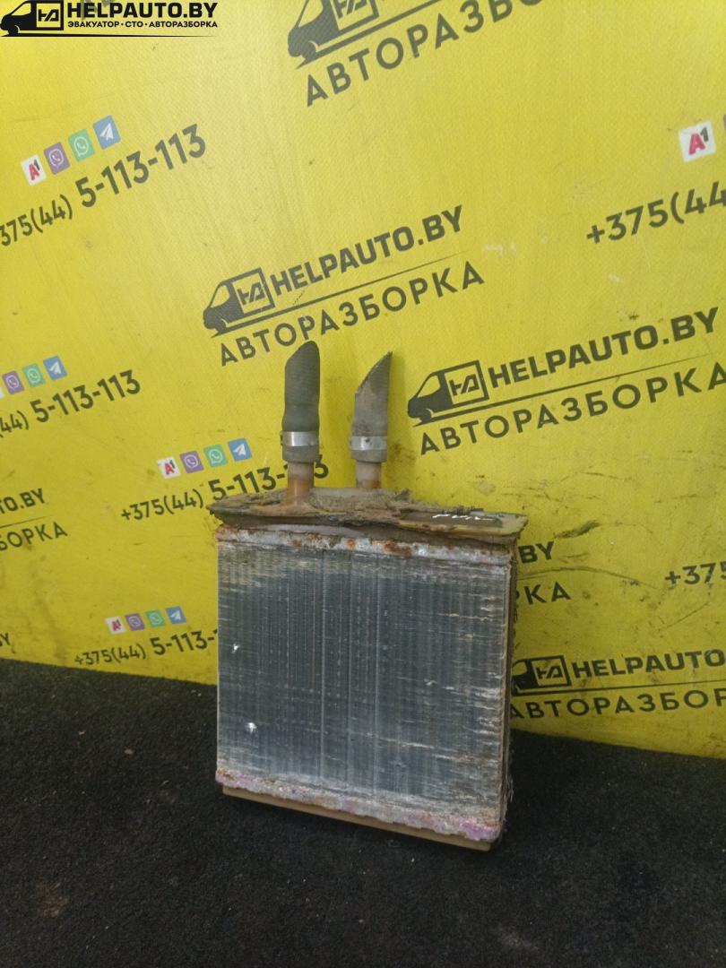 радиатор отопителя (печки) Fiat Punto 1 поколение 1997, 1.2 л., бензин, МКПП, синий, хетчбэк 5 дв. - фото №1