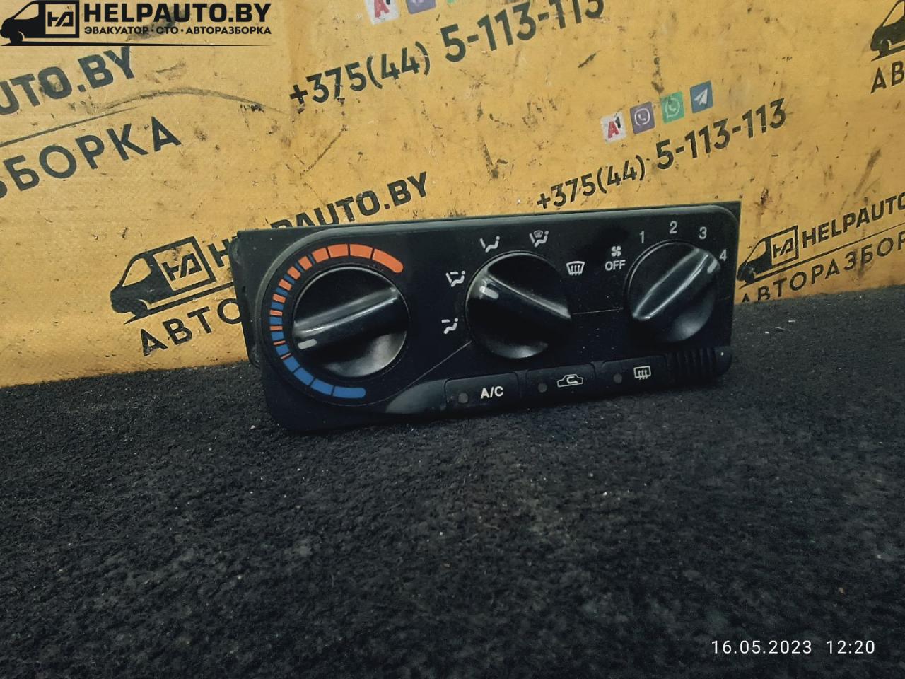 блок управления печки / климат-контроля Daewoo Nubira J100 1998, 2.0 л., бензин, МКПП, красный / зеленый, седан - фото №1