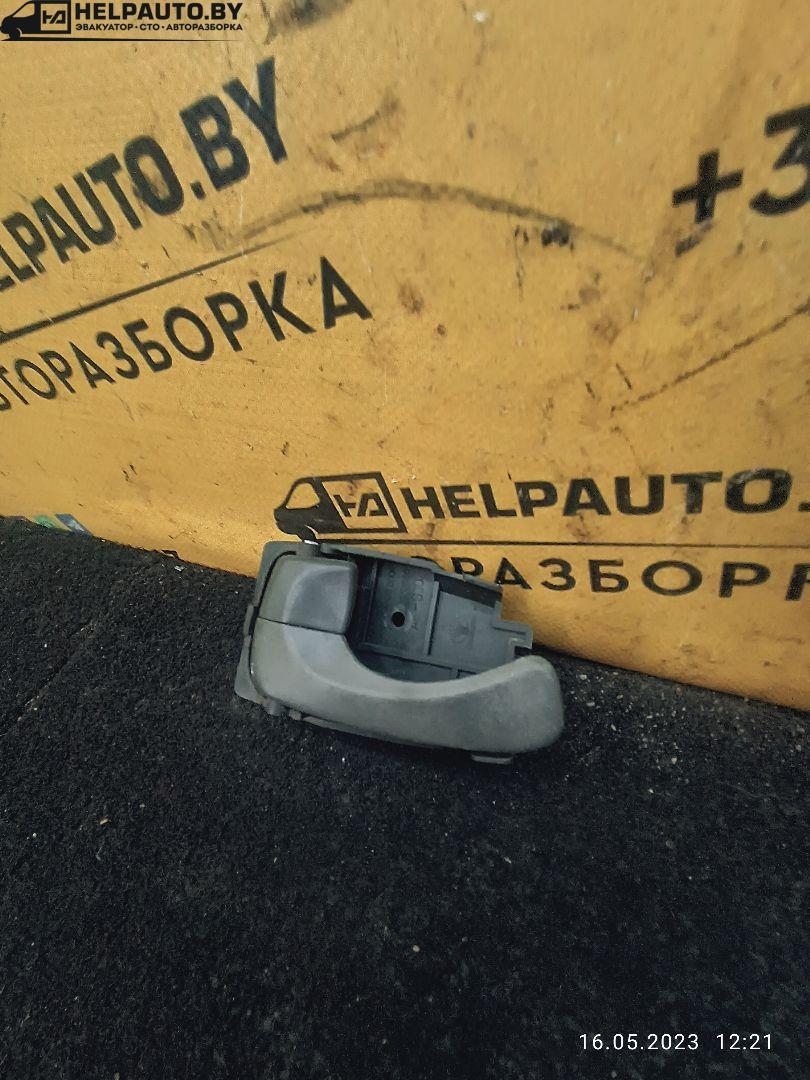ручка внутренняя передняя левая Daewoo Nubira J100 1998, 2.0 л., бензин, МКПП, красный / зеленый, седан - фото №1
