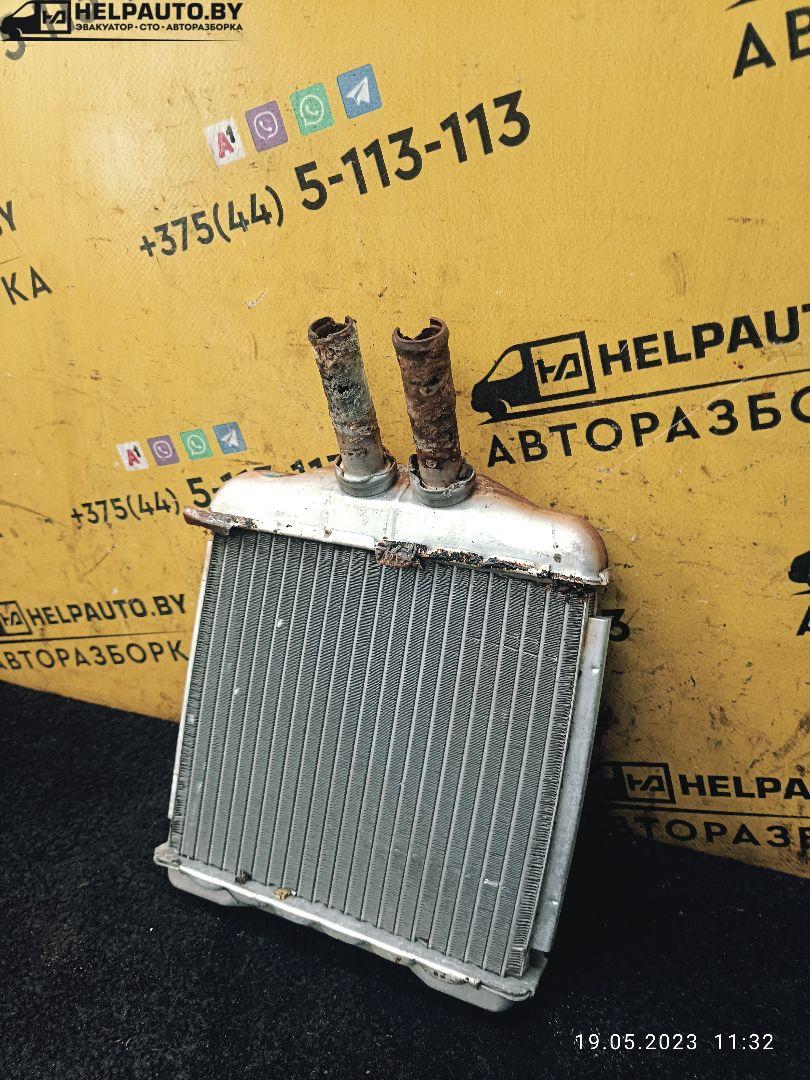 радиатор отопителя (печки) Daewoo Nubira J100 1998, 2.0 л., бензин, МКПП, красный / зеленый, седан - фото №1