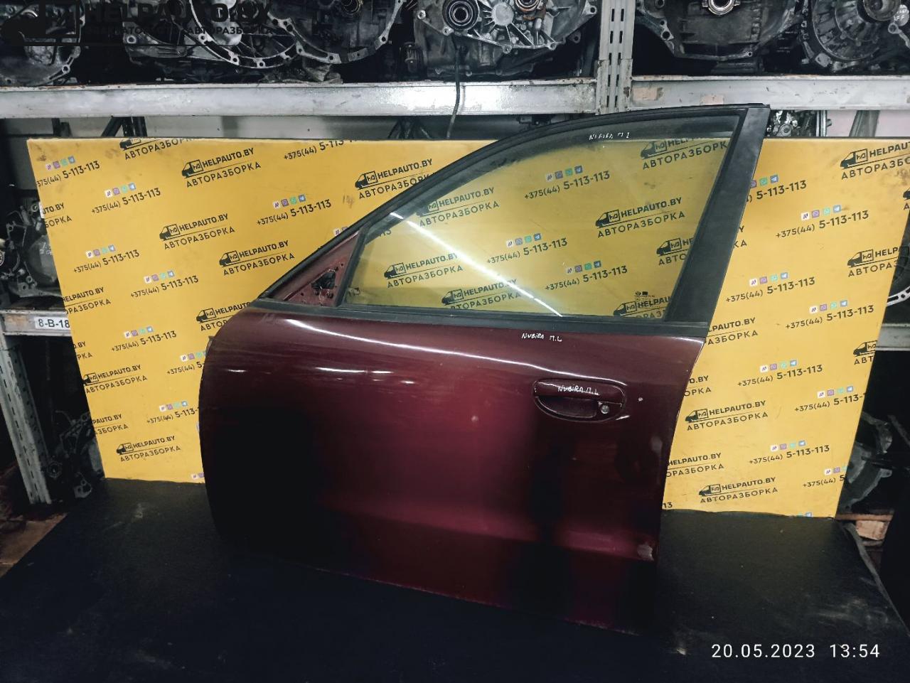 дверь передняя левая Daewoo Nubira J100 1998, 2.0 л., бензин, МКПП, красный / зеленый, седан - фото №1