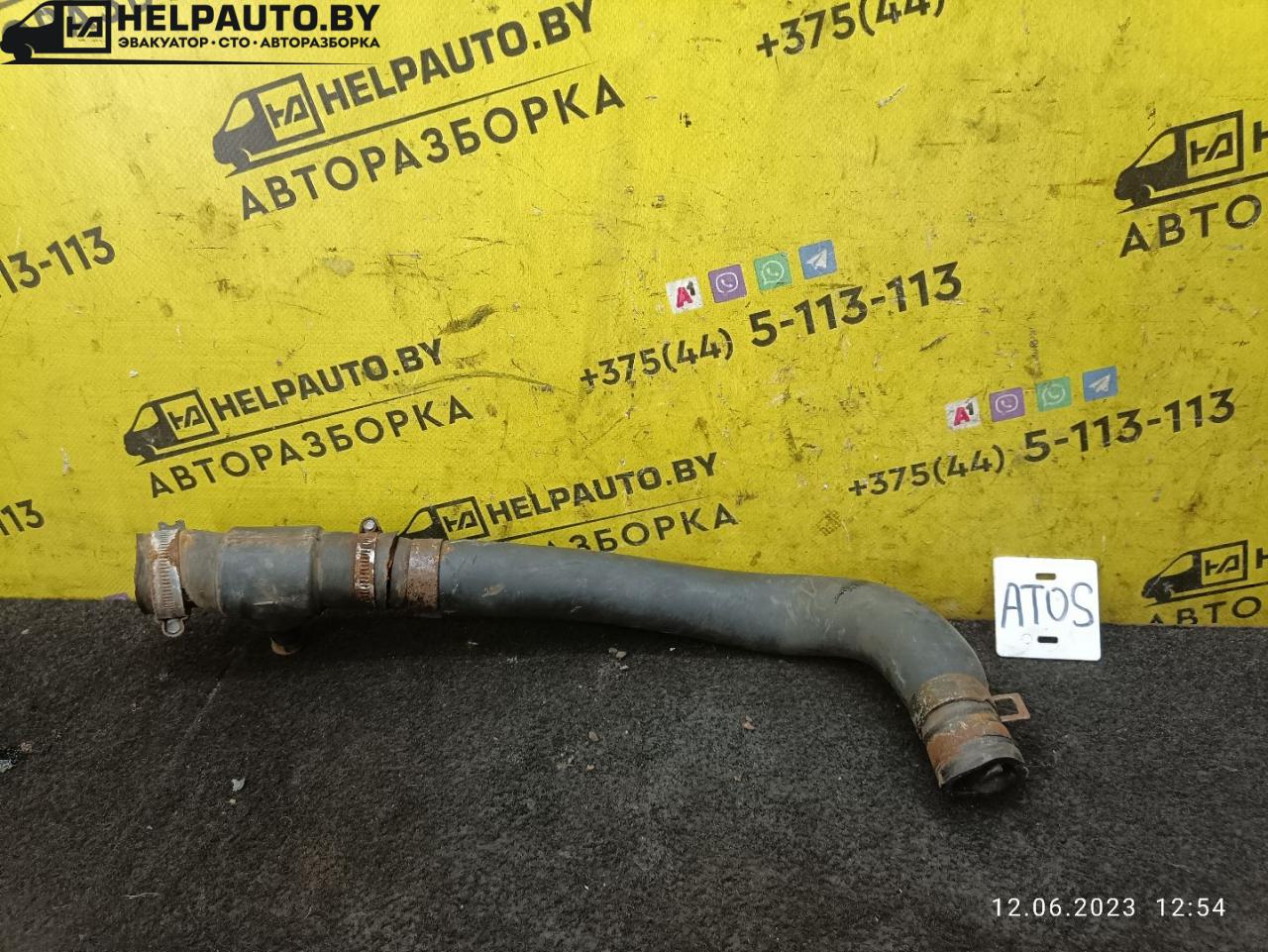 патрубок радиатора Hyundai Atos 1 поколение 2000, 1.0 л., G4HC, бензин, МКПП, черный, хетчбэк 5 дв. - фото №1