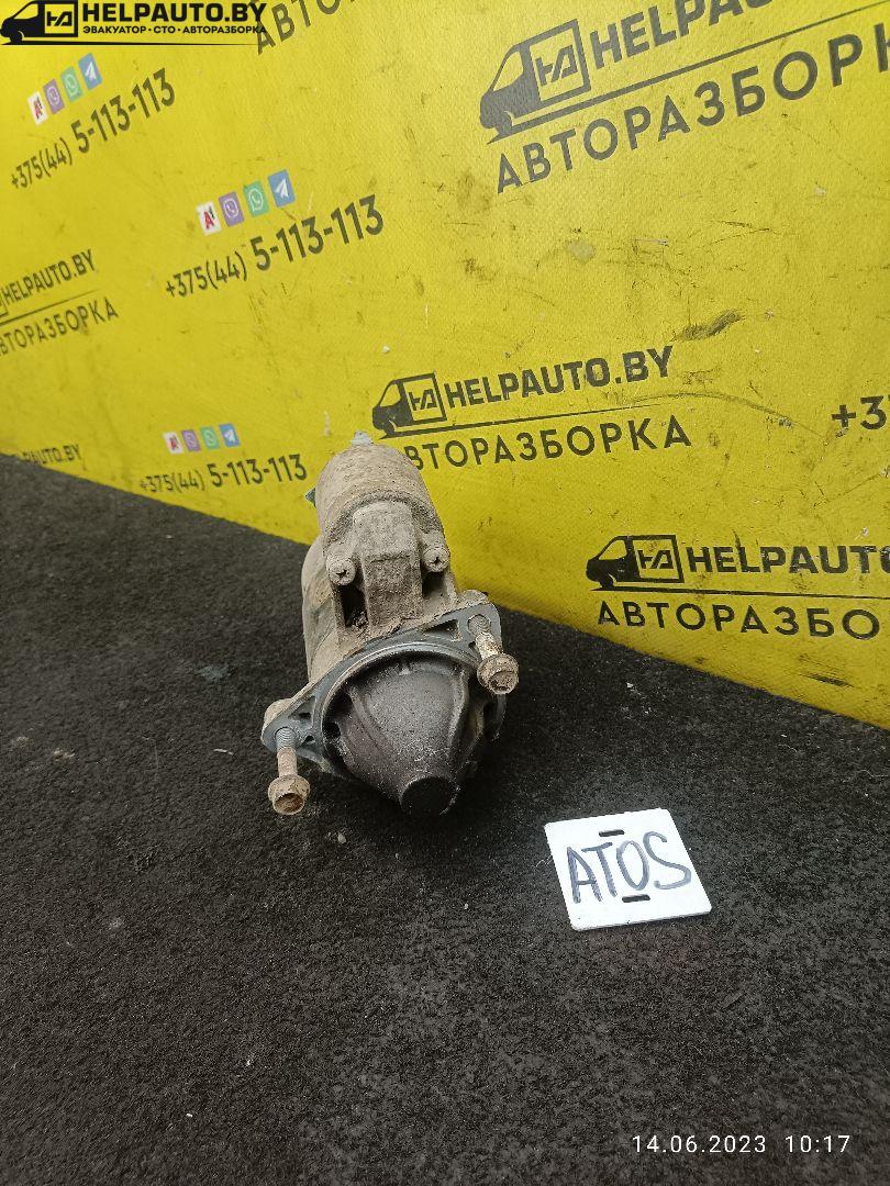 стартер Hyundai Atos 1 поколение 2000, 1.0 л., G4HC, бензин, МКПП, черный, хетчбэк 5 дв. - фото №1