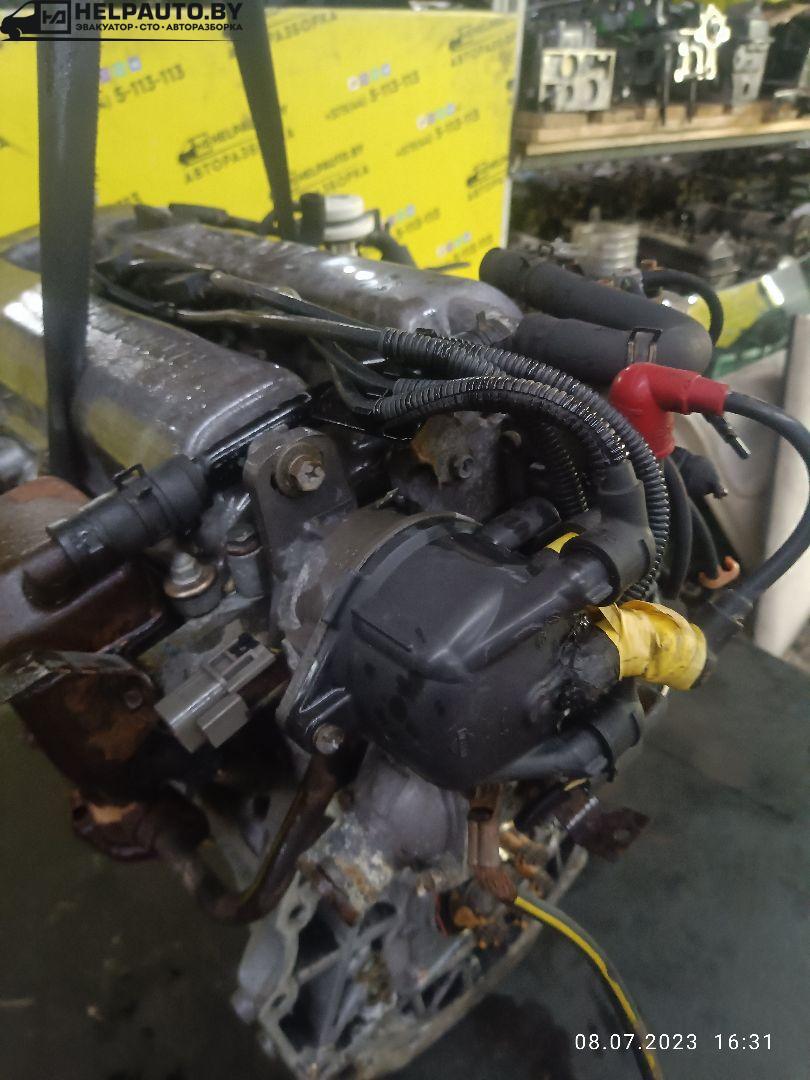 распределитель зажигания (трамблёр) Nissan Primera P10 1996, 2.0 л., бензин, МКПП, серый, универсал - фото №1