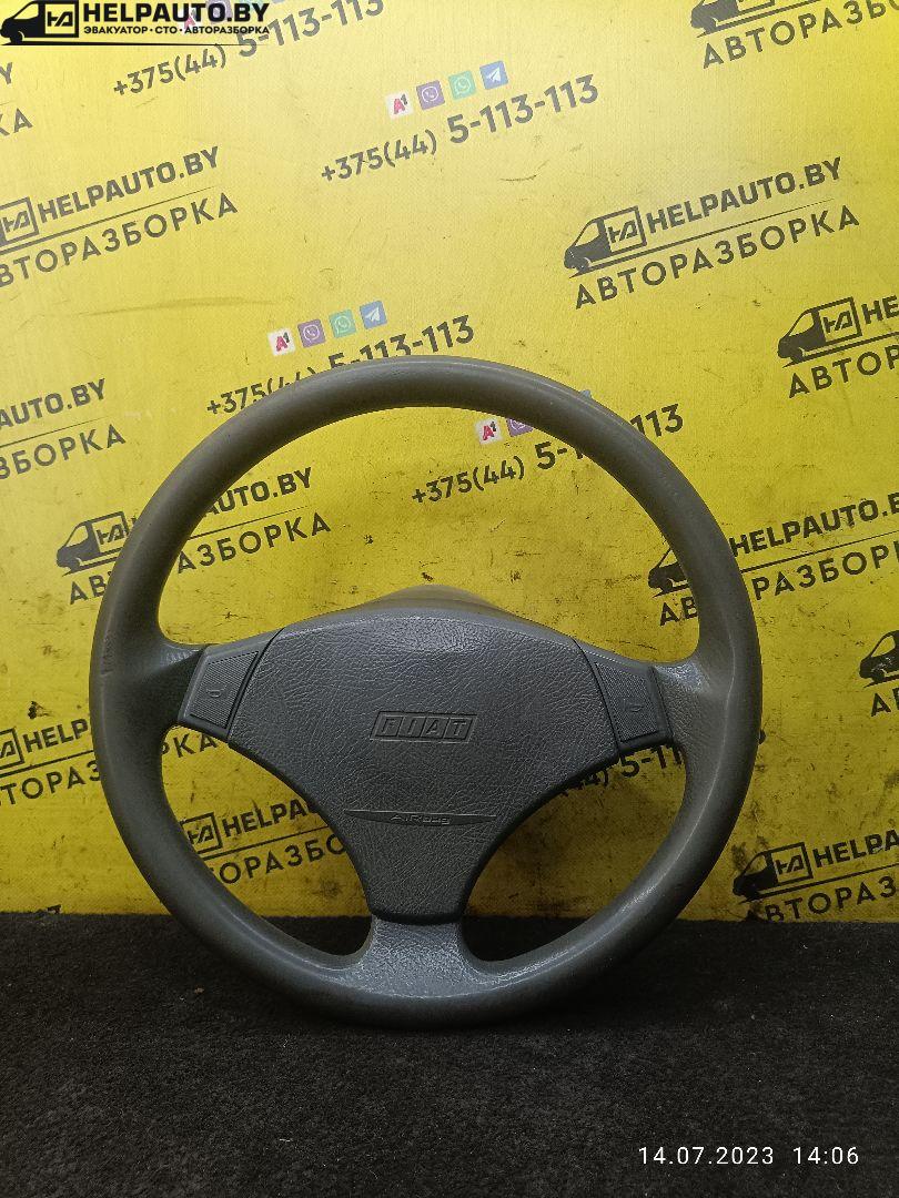 руль Fiat Punto 1 поколение 1997, 1.2 л., бензин, МКПП, белый, хетчбэк 5 дв. - фото №1
