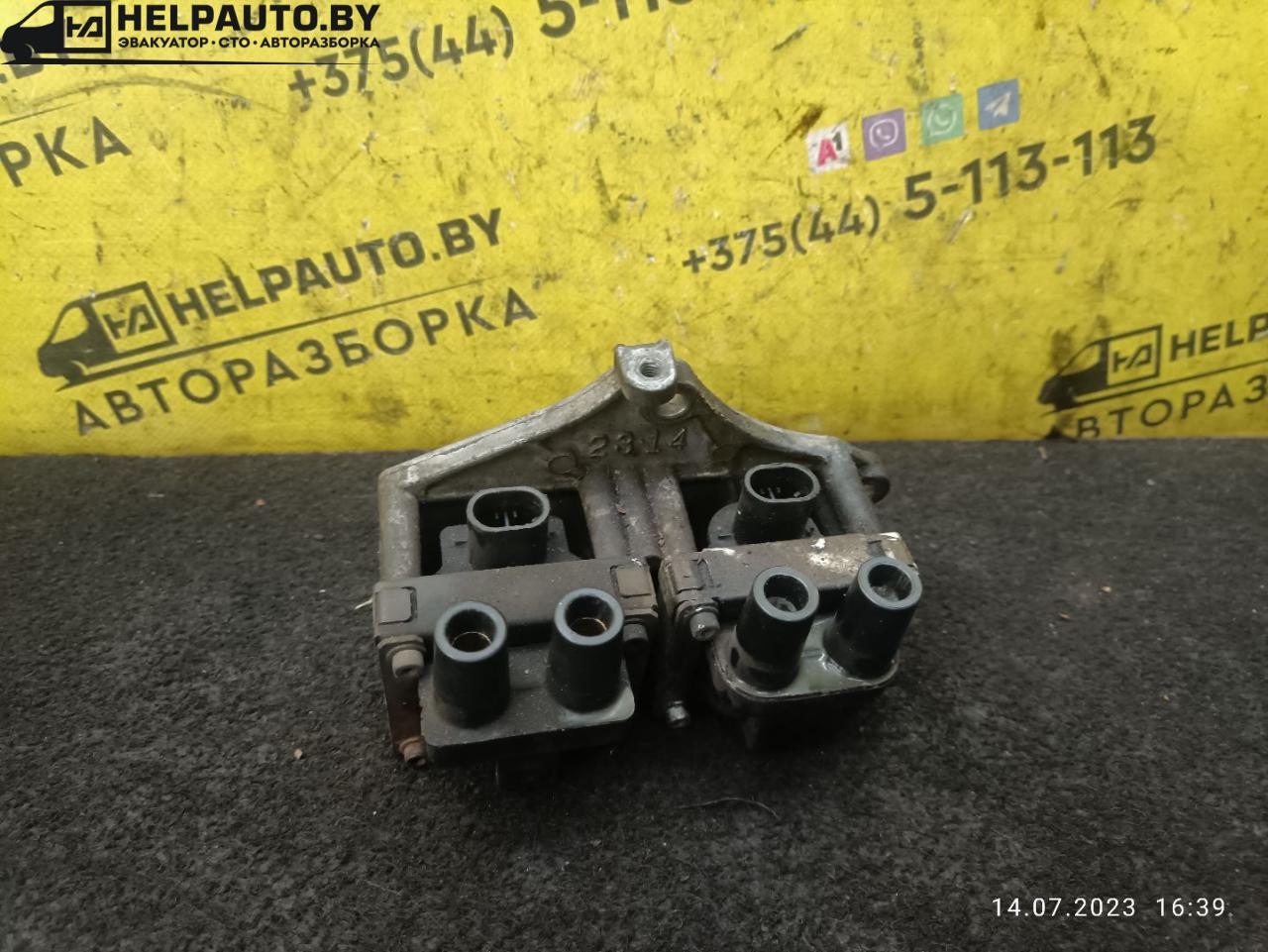 катушка зажигания Fiat Punto 1 поколение 1997, 1.2 л., бензин, МКПП, белый, хетчбэк 5 дв. - фото №1