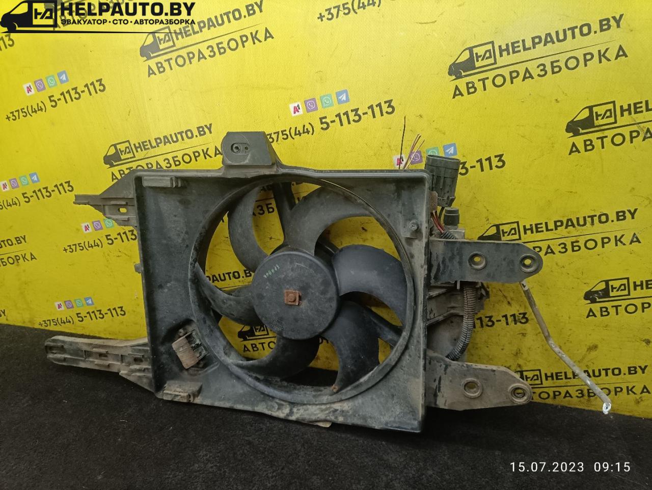 вентилятор радиатора Fiat Punto 1 поколение 1997, 1.2 л., бензин, МКПП, белый, хетчбэк 5 дв. - фото №1