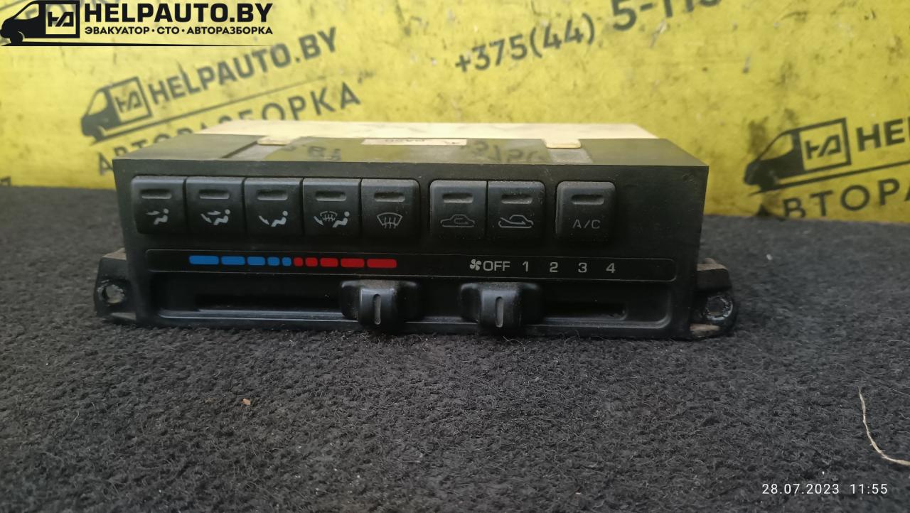блок управления печки / климат-контроля Mazda 626 GE 1992, 1.8 л., бензин, МКПП, красный, хетчбэк 5 дв. - фото №1