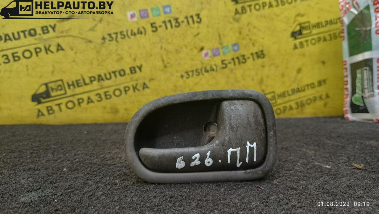 ручка внутренняя передняя правая Mazda 626 GE 1992, 1.8 л., бензин, МКПП, красный, хетчбэк 5 дв. - фото №1