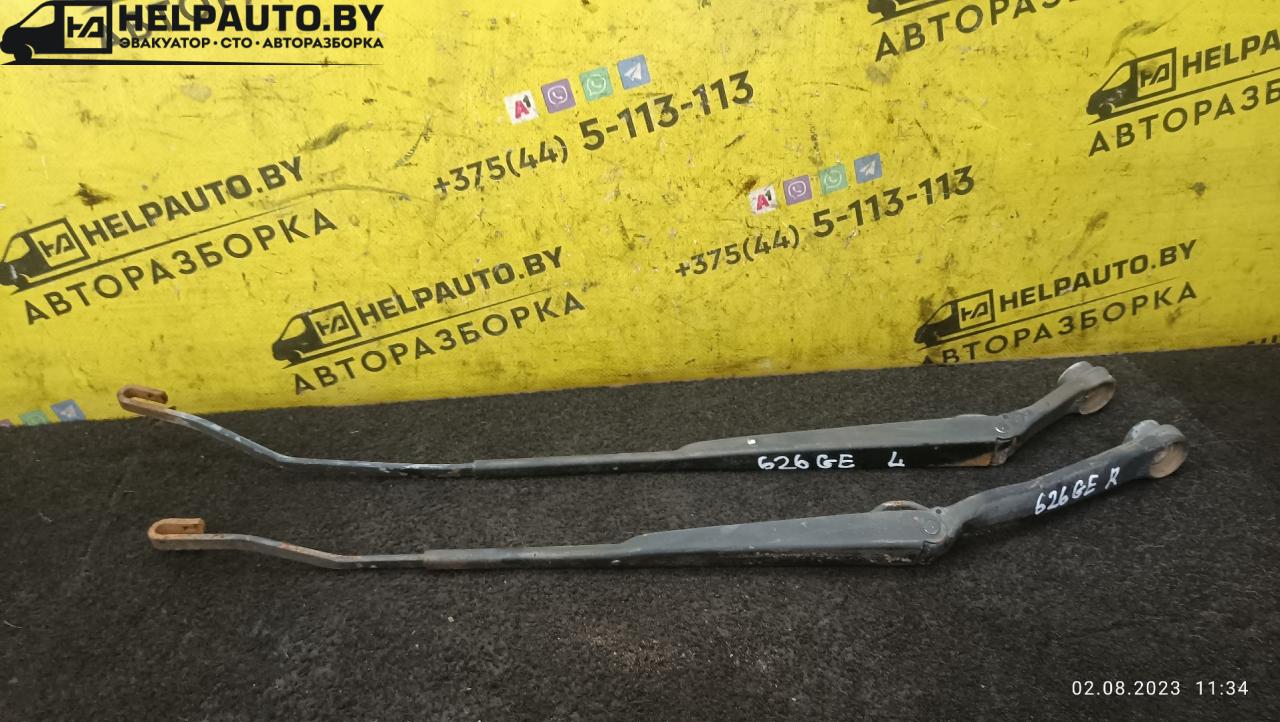 щеткодержатель (поводок стеклоочистителя, дворник) Mazda 626 GE 1992, 1.8 л., бензин, МКПП, красный, хетчбэк 5 дв. - фото №1
