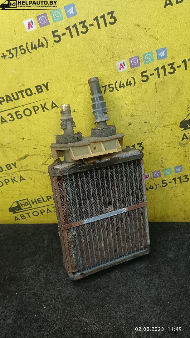 радиатор отопителя (печки) Mazda 626 GE 1992, 1.8 л., бензин, МКПП, красный, хетчбэк 5 дв. - фото №1