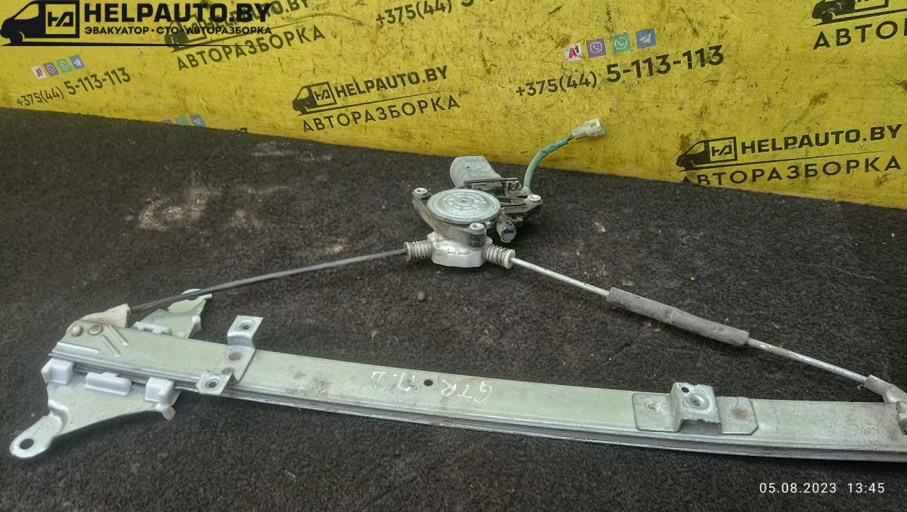 стеклоподъемник электрический передний левый Suzuki Wagon R 1 поколение 1998, 1.0 л., бензин, МКПП, фиолетовый, хетчбэк 5 дв. - фото №1