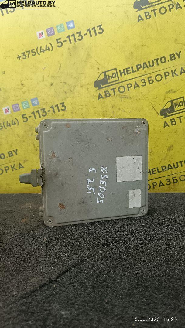 блок управления двигателем Mazda Xedos 6 1 поколение 1996, 2.0 л., бензин, АКПП, черный, седан - фото №1