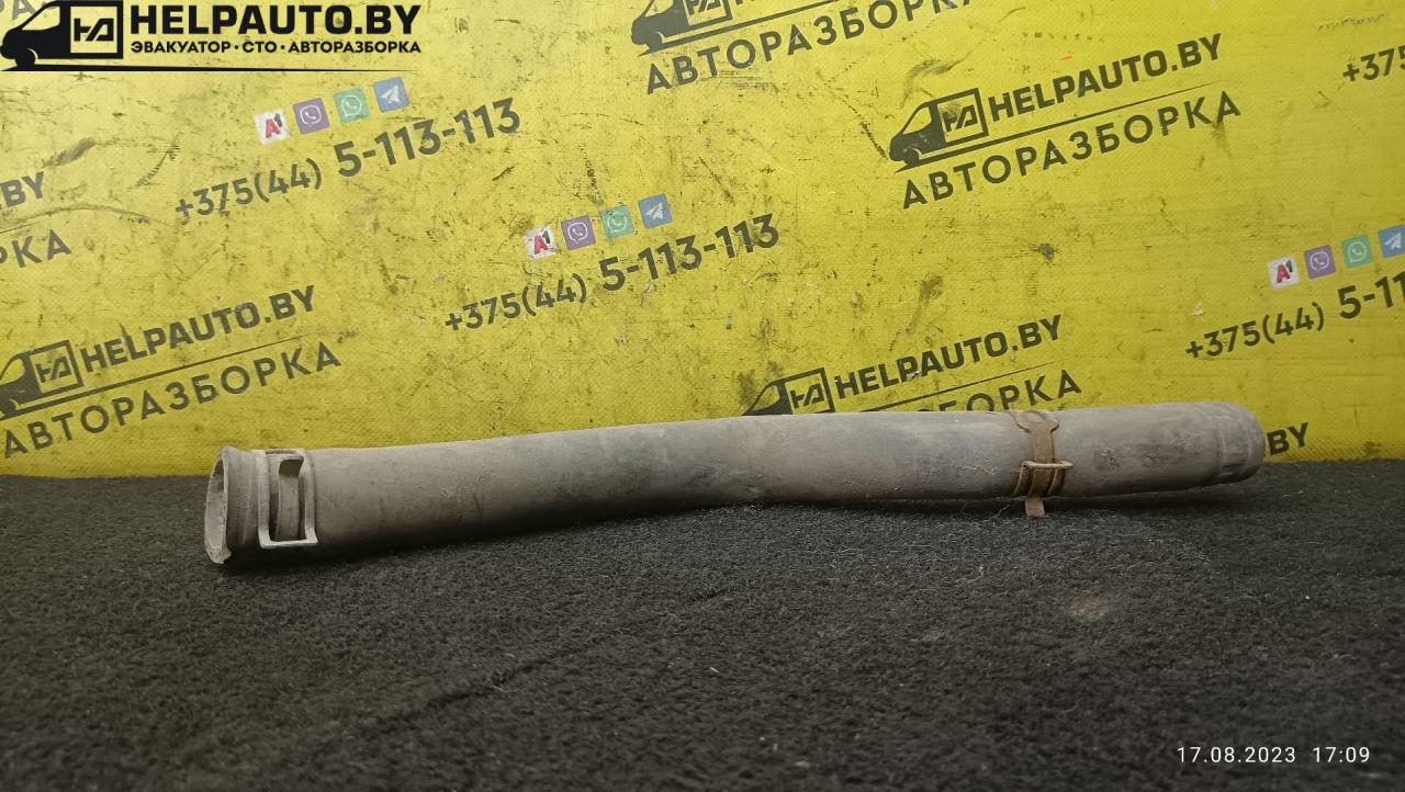 патрубок радиатора Mazda MX-3 1 поколение 1995, 1.6 л., бензин, МКПП, красный, хетчбэк 3 дв. - фото №1