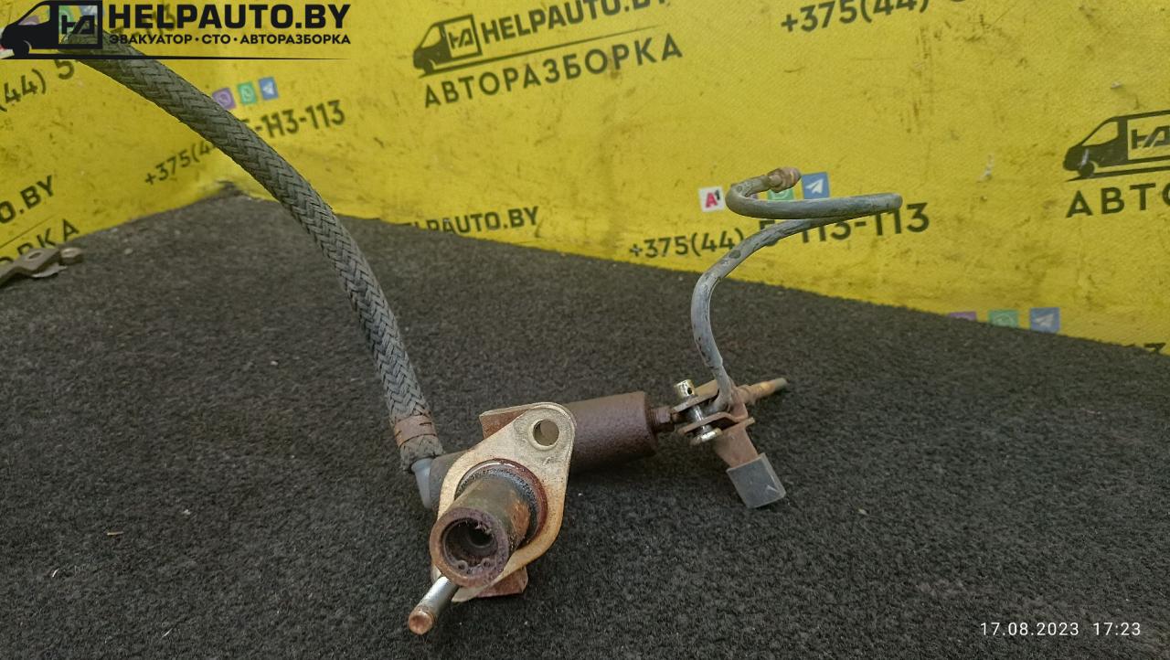 цилиндр сцепления главный Mazda MX-3 1 поколение 1995, 1.6 л., бензин, МКПП, красный, хетчбэк 3 дв. - фото №1