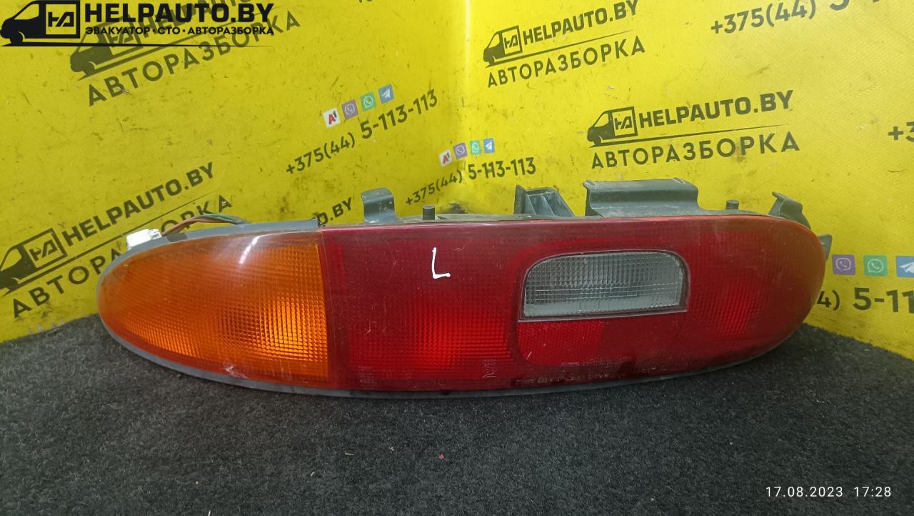 фонарь задний левый Mazda MX-3 1 поколение 1995, 1.6 л., бензин, МКПП, красный, хетчбэк 3 дв. - фото №1