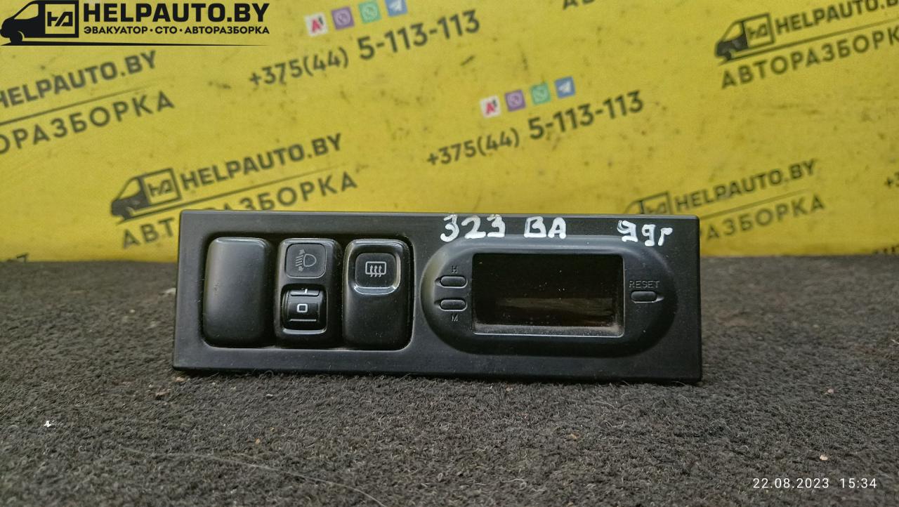часы Mazda 323 6 поколение 1998, 2.0 л., дизель, МКПП, синий, хетчбэк 3 дв. - фото №1