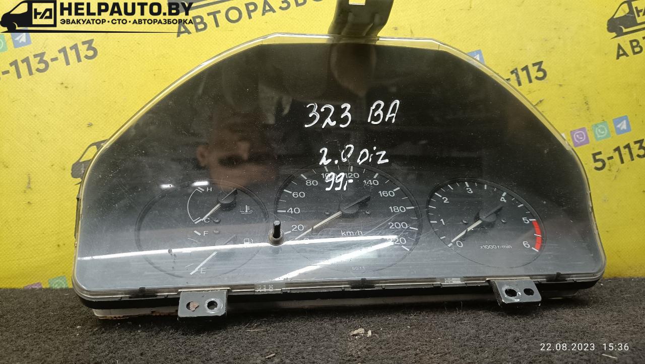 щиток приборов (приборная панель) Mazda 323 6 поколение 1998, 2.0 л., дизель, МКПП, синий, хетчбэк 3 дв. - фото №1
