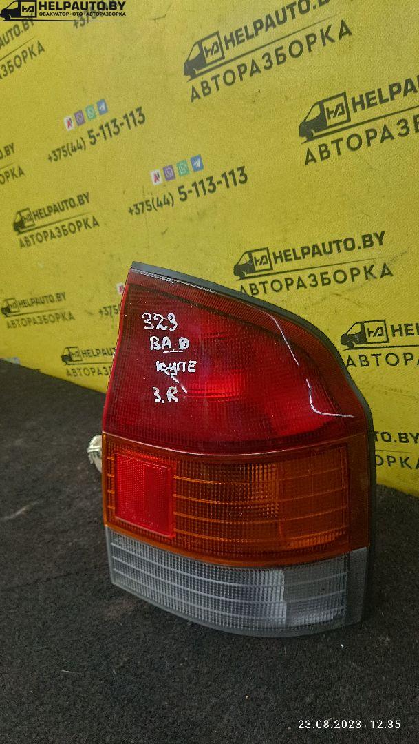 фонарь задний правый Mazda 323 6 поколение 1998, 2.0 л., дизель, МКПП, синий, хетчбэк 3 дв. - фото №1