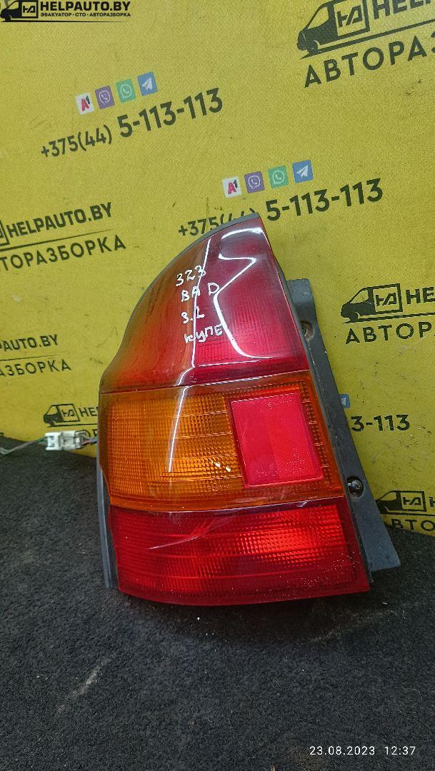 фонарь задний левый Mazda 323 6 поколение 1998, 2.0 л., дизель, МКПП, синий, хетчбэк 3 дв. - фото №1