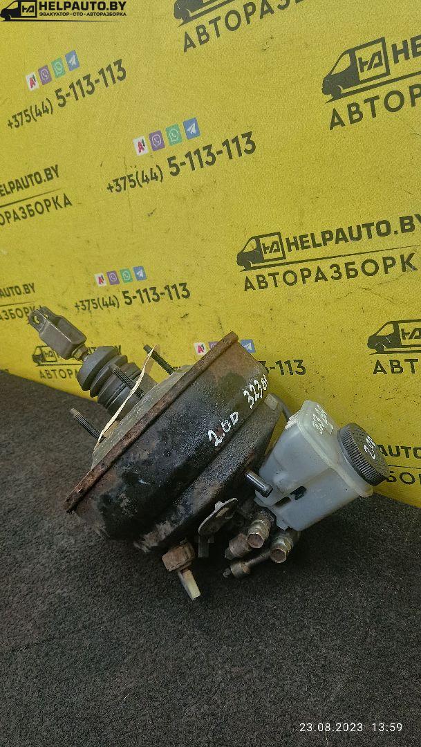 цилиндр тормозной главный Mazda 323 6 поколение 1998, 2.0 л., дизель, МКПП, синий, хетчбэк 3 дв. - фото №1
