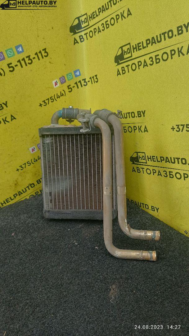 радиатор отопителя (печки) Mitsubishi Galant 5 поколение 1985, 2.0 л., бензин, МКПП, черный, седан - фото №1