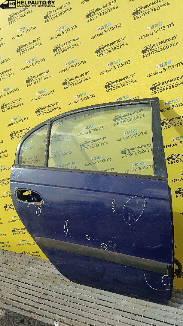 дверь задняя правая Toyota Avensis 1 поколение (T220) 1999, седан - фото №1