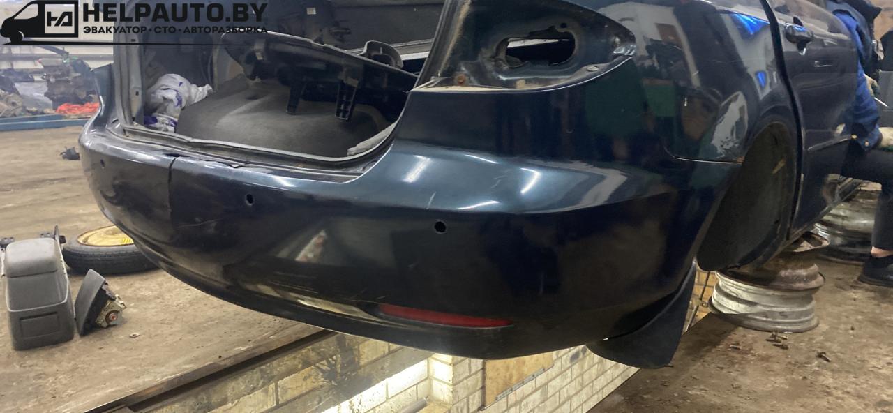 бампер задний Mazda 6 GG 2003, 1.8 л., L8-DE, бензин, АКПП, черный, хетчбэк 5 дв. - фото №1