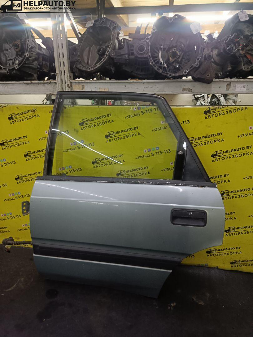дверь задняя левая Mazda 626 3 поколение 1990, 2.0 л., F8 (12V), бензин, 5МКПП, серебристый, седан, передний привод - фото №1